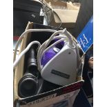 A Morphy Richards digital steam iron