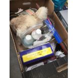 A miscellaneous box including coat hooks, light bulbs, soft toy, ornaments etc