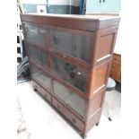 An Edwardian mahogany sectional bookcase.