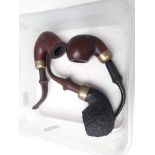 Three Peterson smoking pipes