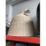 A large wicker light fitting