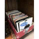 A box of 1960s vinyl singles