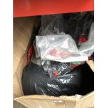 A box of fancy dress costumes including halloween type
