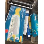 2 book binders and boxes of spiral binders