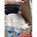 A box of linen and table clothes