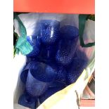 A bag of blue plastic drinking glasses