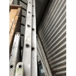 A set of large extending aluminium ladders