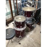 A 5 piece drum kit plus 5 cymbals, including Pearl and Paiste, and stool