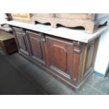 A large Edwardian shop counter with marble top.