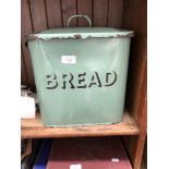 A metal bread bin