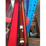 A cased snooker cue