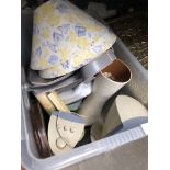 A crate of mixed items including handbags, speakers, vases etc