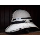 A vintage Merseyside fireman's helmet