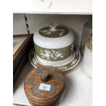 A large cheese/cake platter (as found) and a wooden bowl with lid decorated with florins