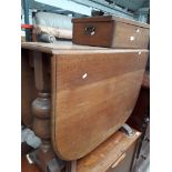 An oak canteen box and drop leaf table.