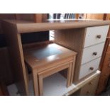 A veneered dressing table and a nest of tables.