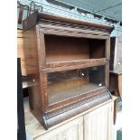 A 1920s two part oak sectional bookcase.