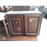 A Georgian oak table cabinet.