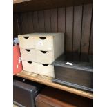 A small 6 drawer storage box and a hinged box