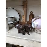 A small collection of treen - carved animals on serviette rings, and carved lions