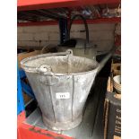A Galvanised watering can and bucket