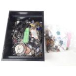 A box of keyrings and pins etc