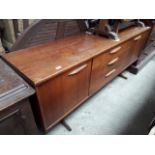 A retro teak sideboard.