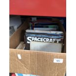 A box of books including text books, annuals, etc