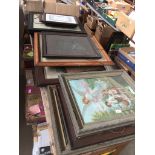 A table top of vintage pictures and frames