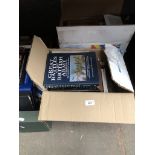 2 boxes of books related to military and antiques.