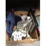 A box of items inc tiffany style light shade, chandelier, riding hat and vest, etc