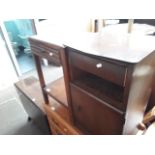 Three items of furniture comprising a mahogany drop leaf table, a bedside table and a bedside