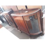 A 1930s mahogany display cabinet.