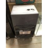 A portable Calor gas heater complete with gas bottle