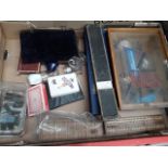 A mixed box including cased balancing scales, toy soldiers, parcel wax, playing cards etc