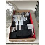 A box containing a large collection of payphone cards