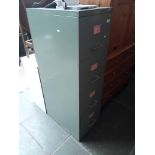 A metal filing cabinet.