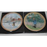 A pair of Artis Orbis Goebel porcelain dishes with design by Carl Larsson, diam. 32cm, each boxed.