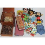 A box of assorted toys and games including marbles, two Pelham Puppets, two rubber Mickey Mouse