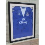 An Everton FC football shirt, autographed by first team squad season 2009-10, glazed and framed.
