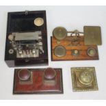 A vintage Ever Ready electro therapy machine together with a set of brass postal scales and weights,