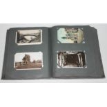 An album containing approx. 200 postcards.