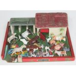 A wooden 'Amersham Toys' model farm with various mainly die-cast model animals and figures.