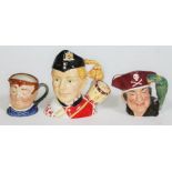 A group of three Royal Doulton character jugs comprising; North Staffordshire Drummer Boy D7211 with