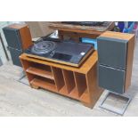 A Bang & Olufsen Beocenter 5000 with associated stand and a pair of Beovox S45 speakers with stands.