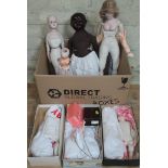 Two boxes of mainly ceramic dolls bodies, body parts and accessories etc