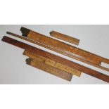 A bundle of wooden old rulers