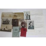 A group of 8 military photographs and postcards etc.