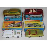 A group of four boxed die-cast model cars comprising two Matchbox: Mercury Police car 55 and Mercury