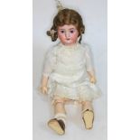 An early 20th century S.F.B.J 60 Paris bisque headed doll, with composite body and articulated